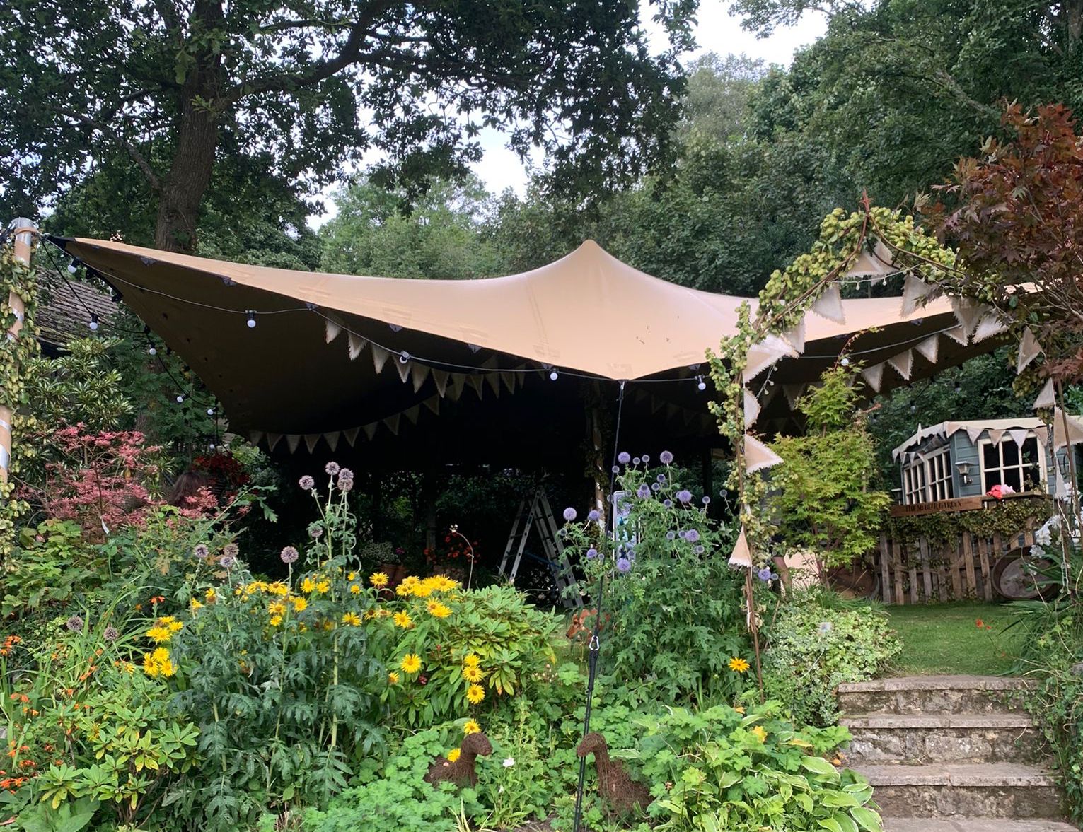 small stretch tent in garden party